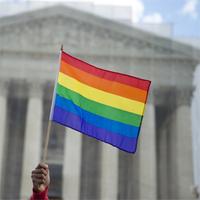 Supreme Court strikes down DOMA and rejects Prop 8 challenge.